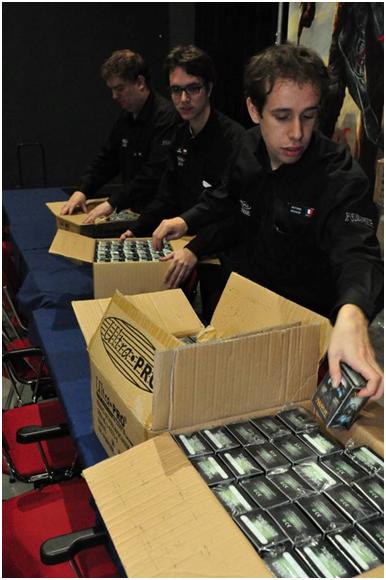 Thomas Frank, Joep Verhoeven and Antoine Bouaziz preparing deck boxes at GP—Bochum ‘10